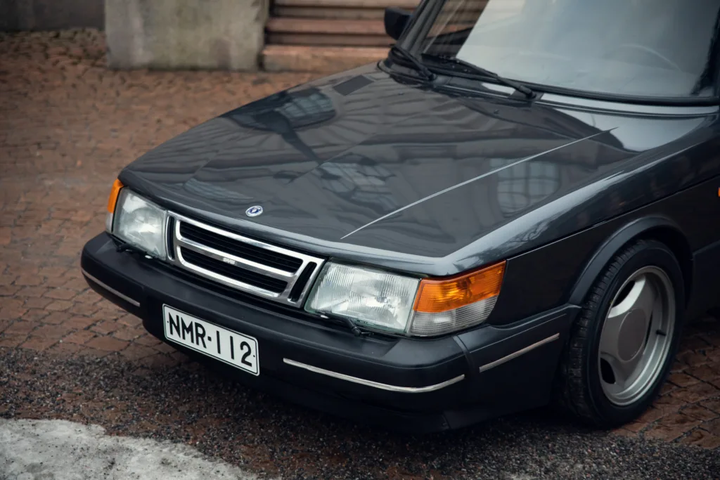 Vintage black sedan car front view.