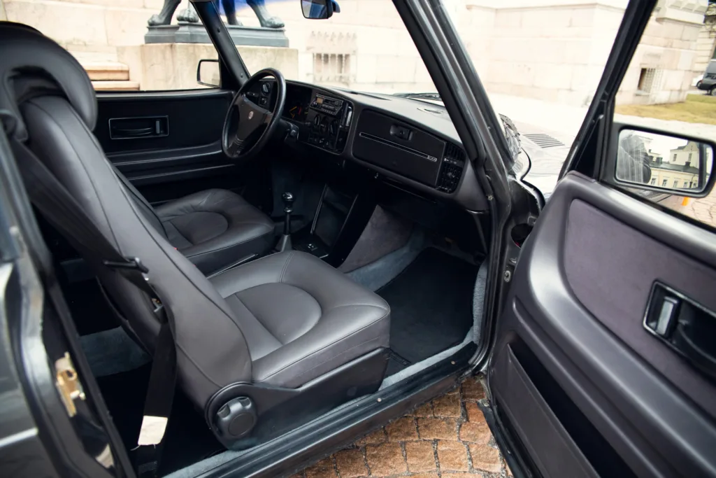 Vintage car interior with leather seats.