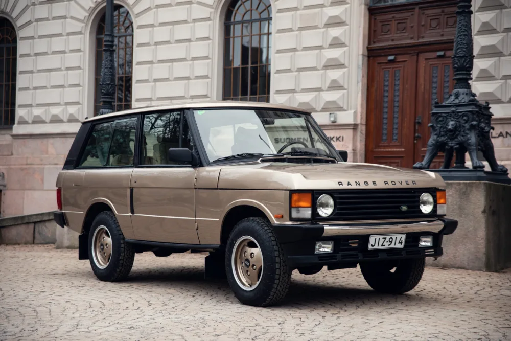 Classic Range Rover parked in urban setting
