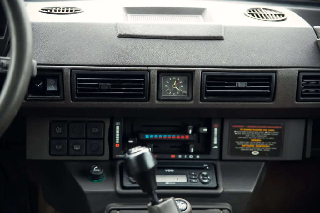 Vintage car dashboard and gear shift.