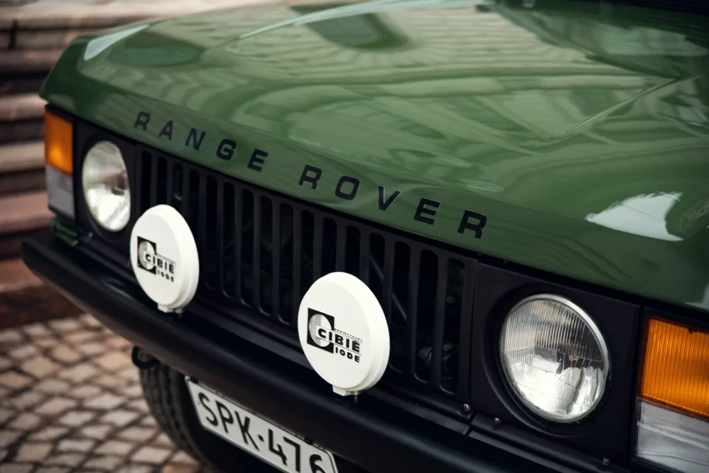 Green Range Rover front grille and headlights.