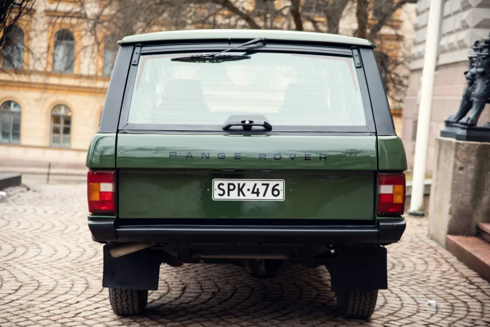 Green Range Rover Classic rear view.