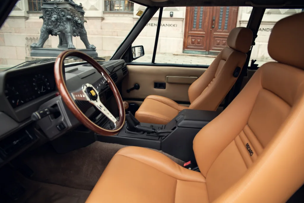 Vintage car interior with leather seats.