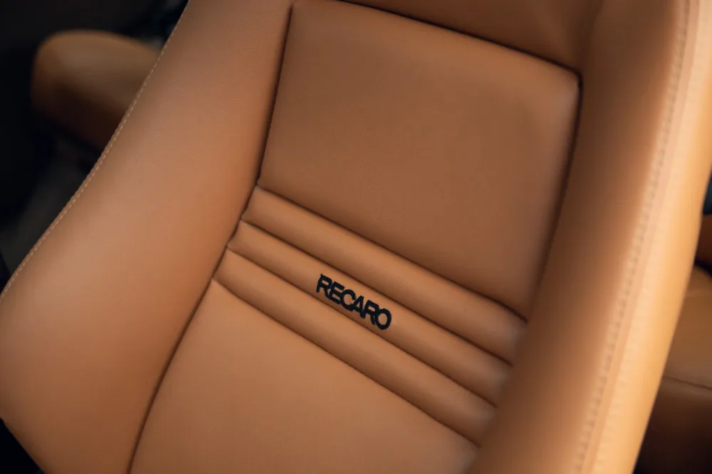 Brown leather Recaro car seat detail
