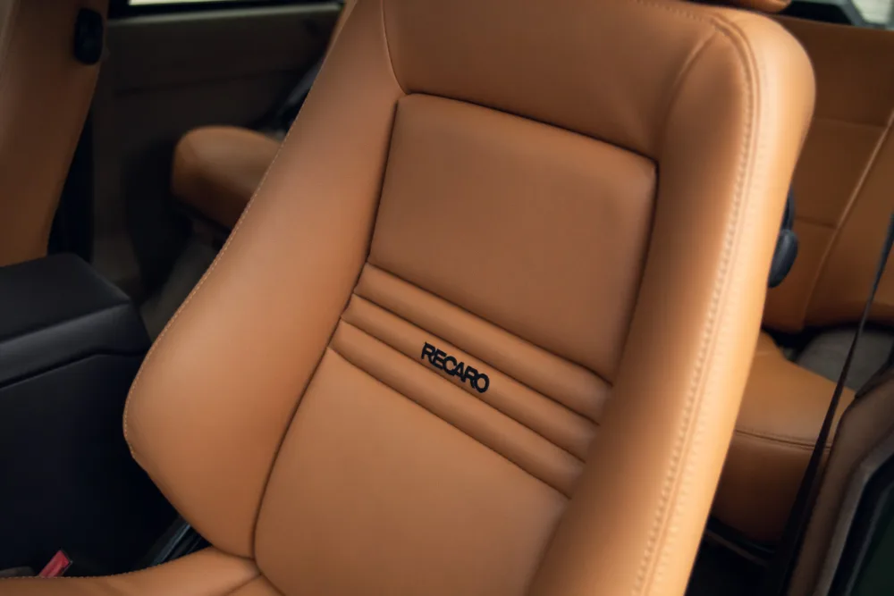 Luxury car brown leather Recaro seat interior