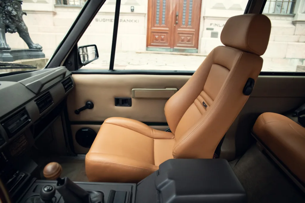 Vintage car interior with leather seats.