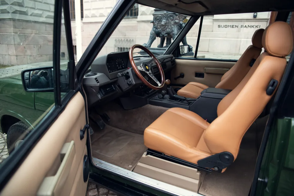 Vintage car interior with leather seats.