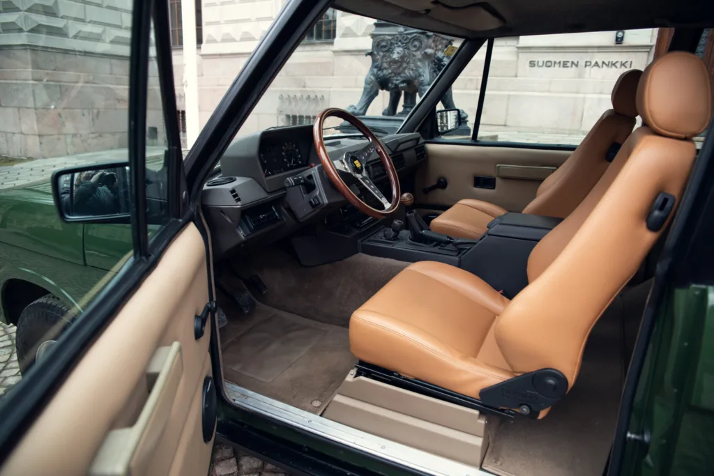 Vintage car interior with leather seats.