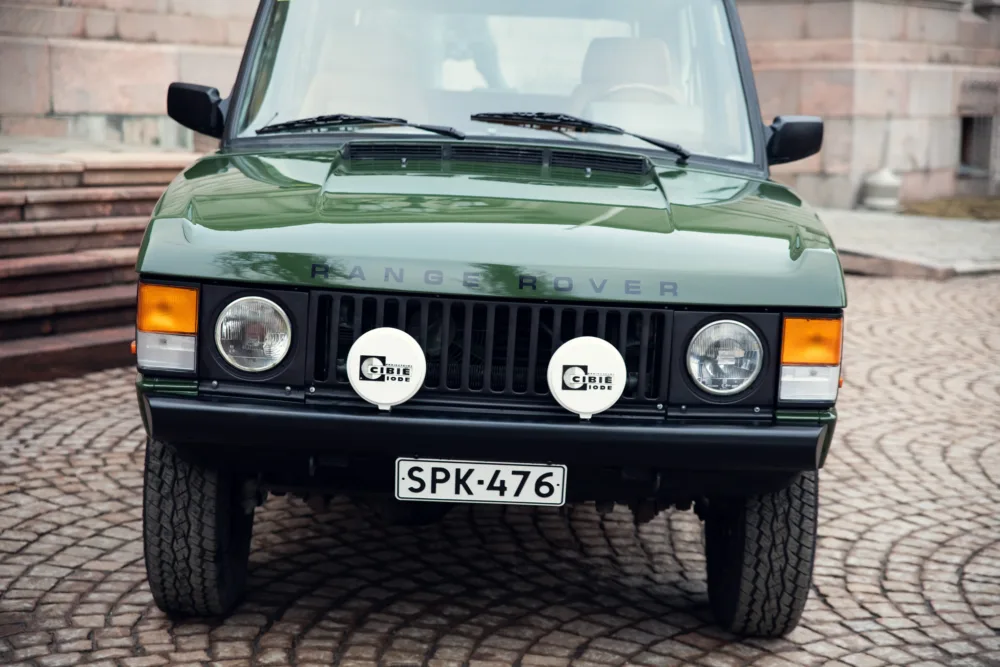 Vintage green Range Rover front view.
