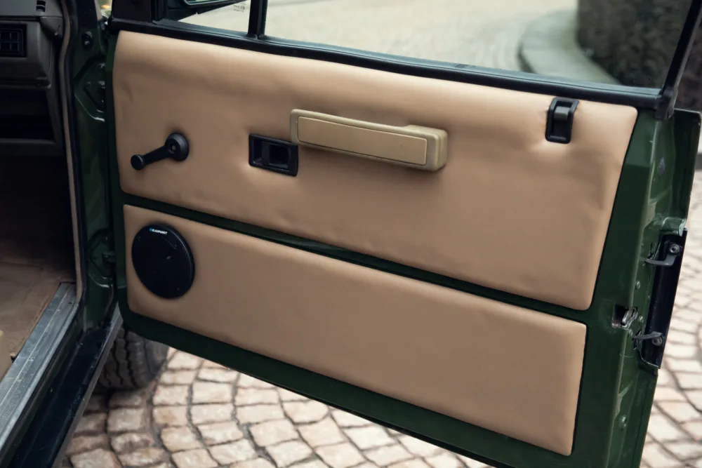Classic car beige door interior details.