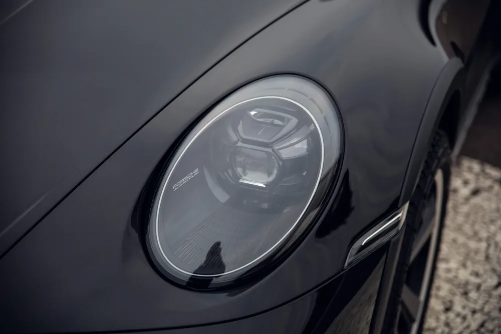 Close-up of modern car headlight design.