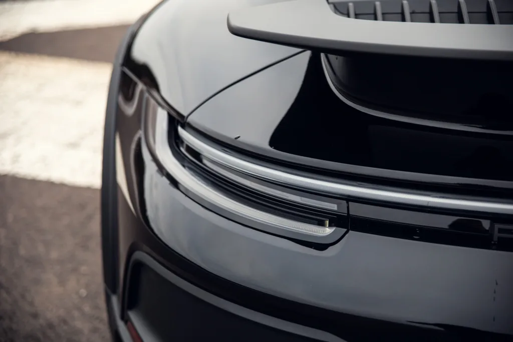 Close-up of modern car's rear and taillights.