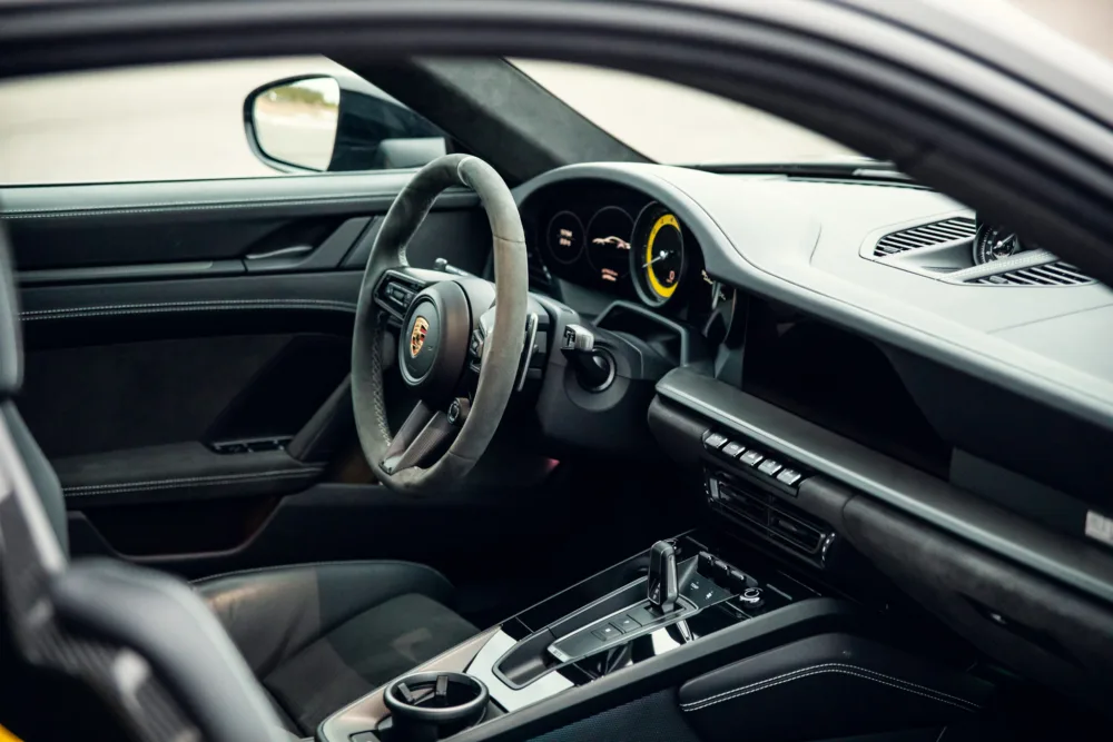 Luxury car interior, steering wheel and dashboard