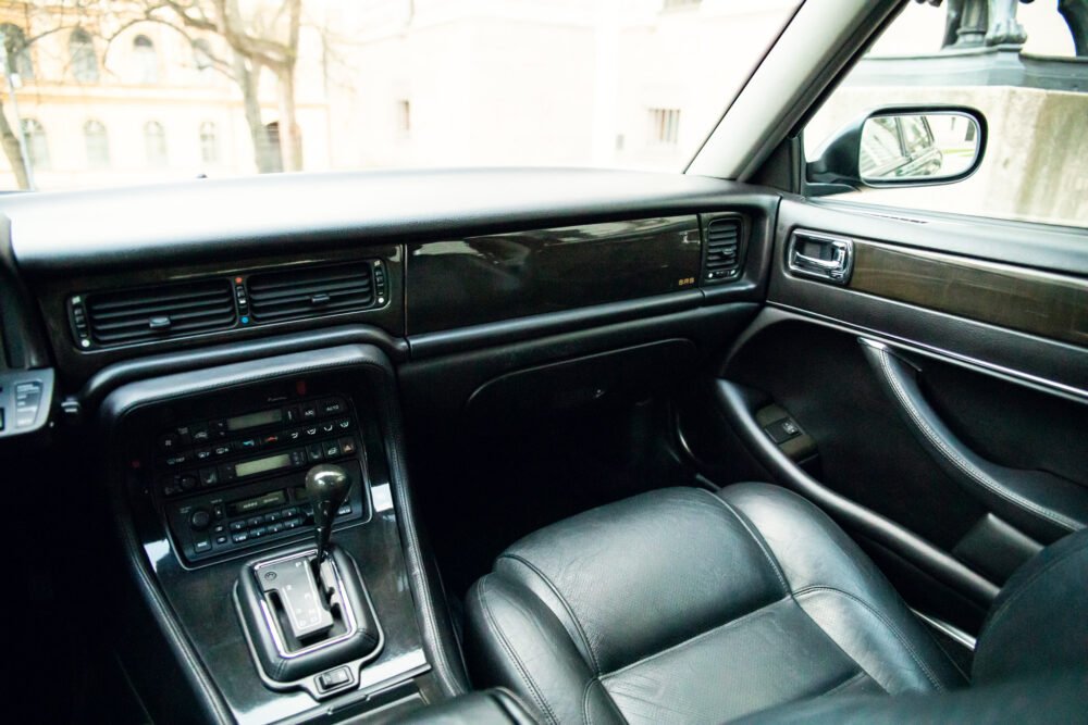 Interior of modern car with leather seats and dashboard.