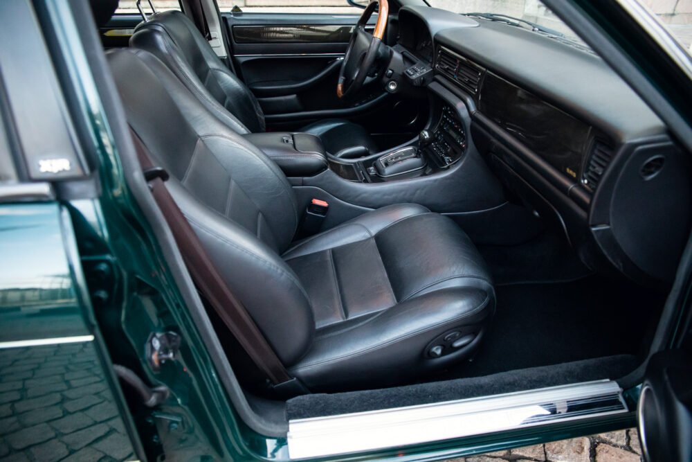 Black leather interior of a luxury car.