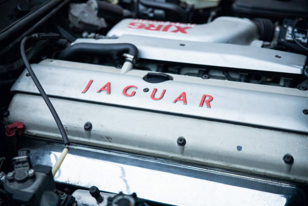 Jaguar engine close-up with logo detail.