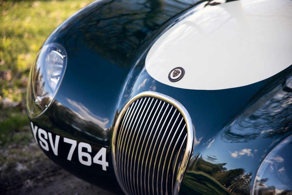 Close-up of vintage car's hood and grille.