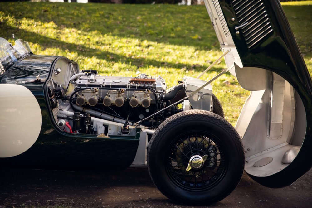 Vintage car engine exposed, detailed restoration.