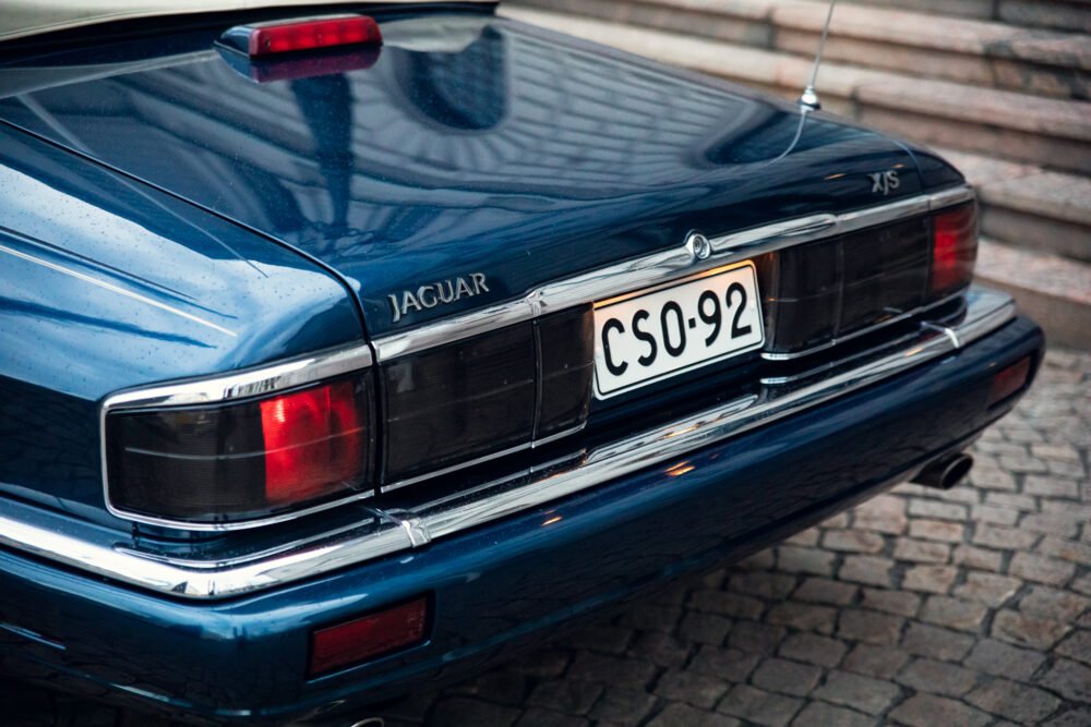 Blue Jaguar XJS rear with license plate.