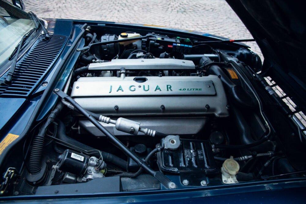 Jaguar 4.0 litre engine under open hood.