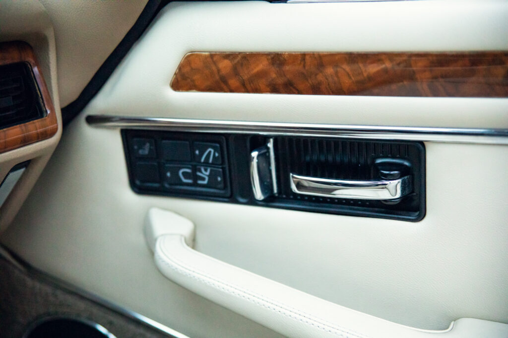Vintage car's door handle and control buttons