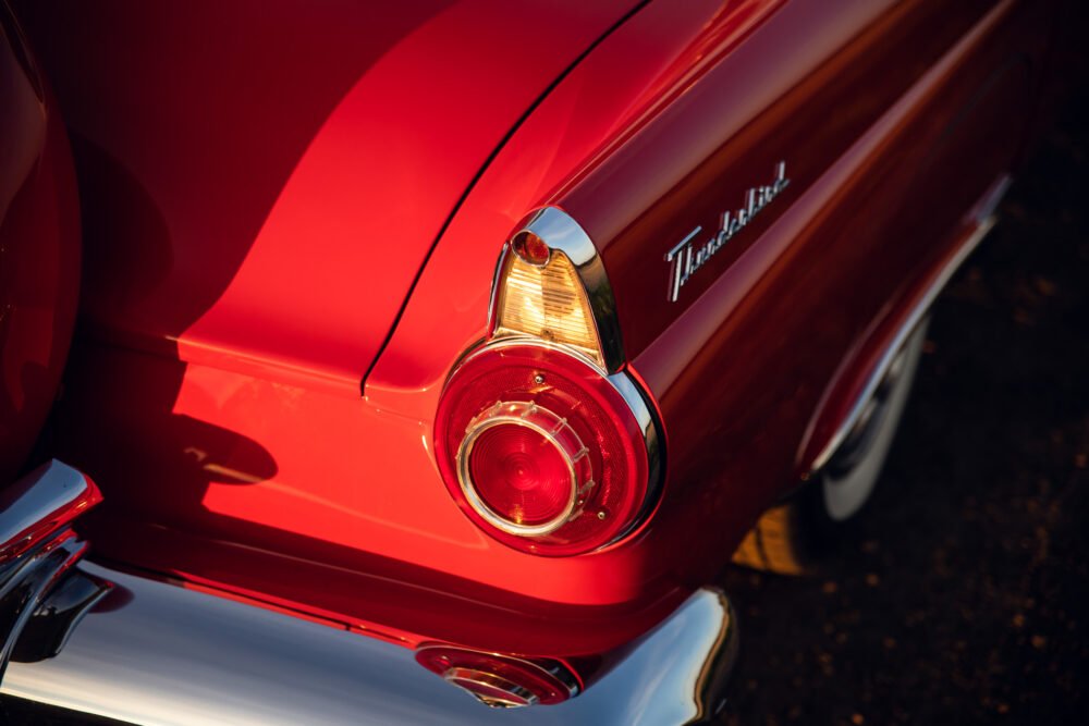 Close-up of classic Thunderbird car's red tail light.
