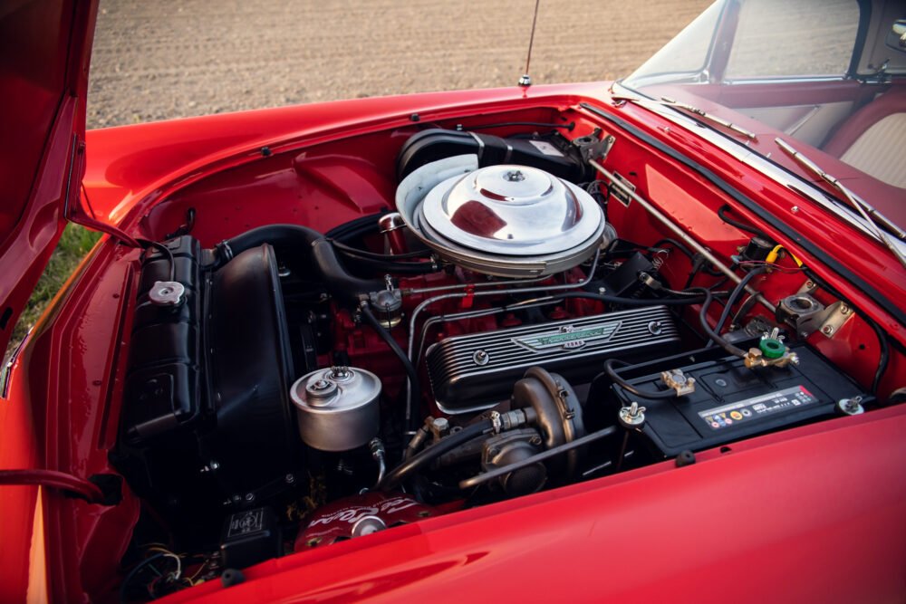 Red vintage car engine, detailed and immaculate restoration.