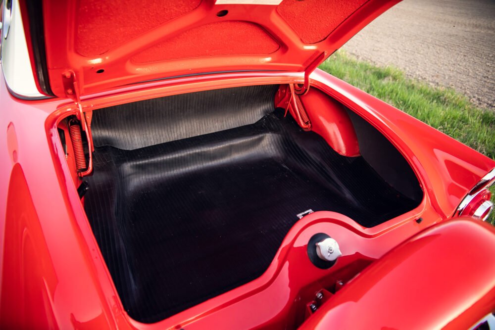 Red vintage car trunk interior view.