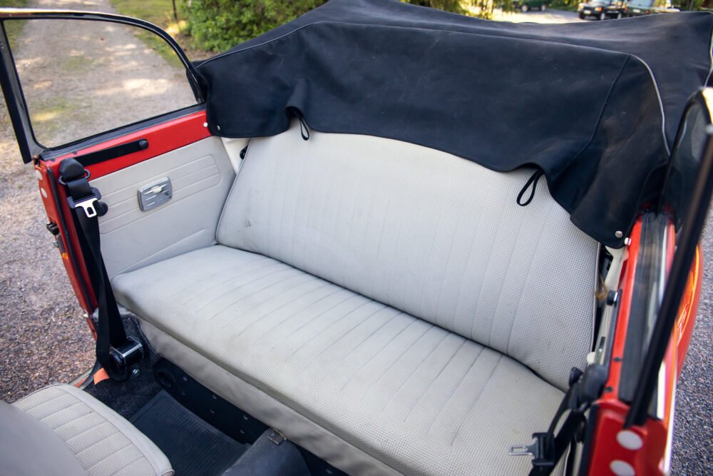 Rear seat of a vintage red convertible car