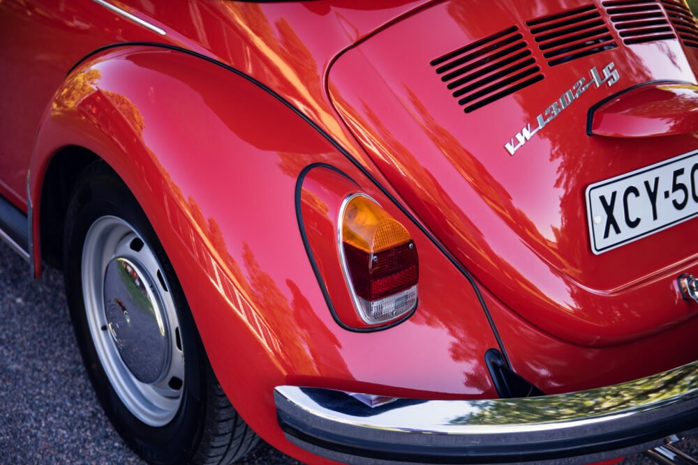 Red vintage Volkswagen Beetle, close-up rear view.