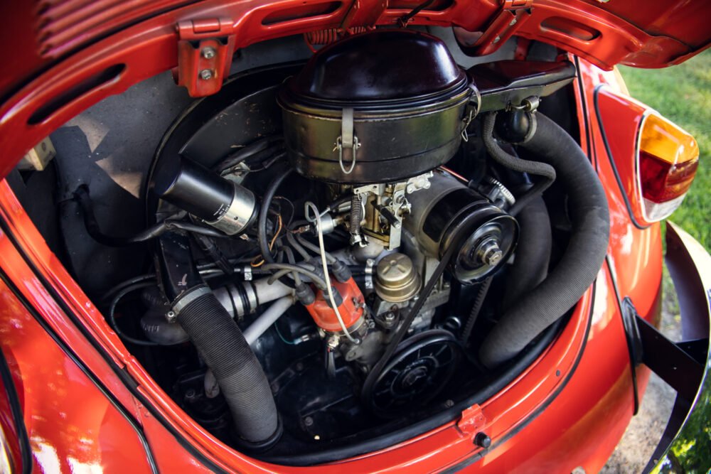 Vintage red car engine close-up.