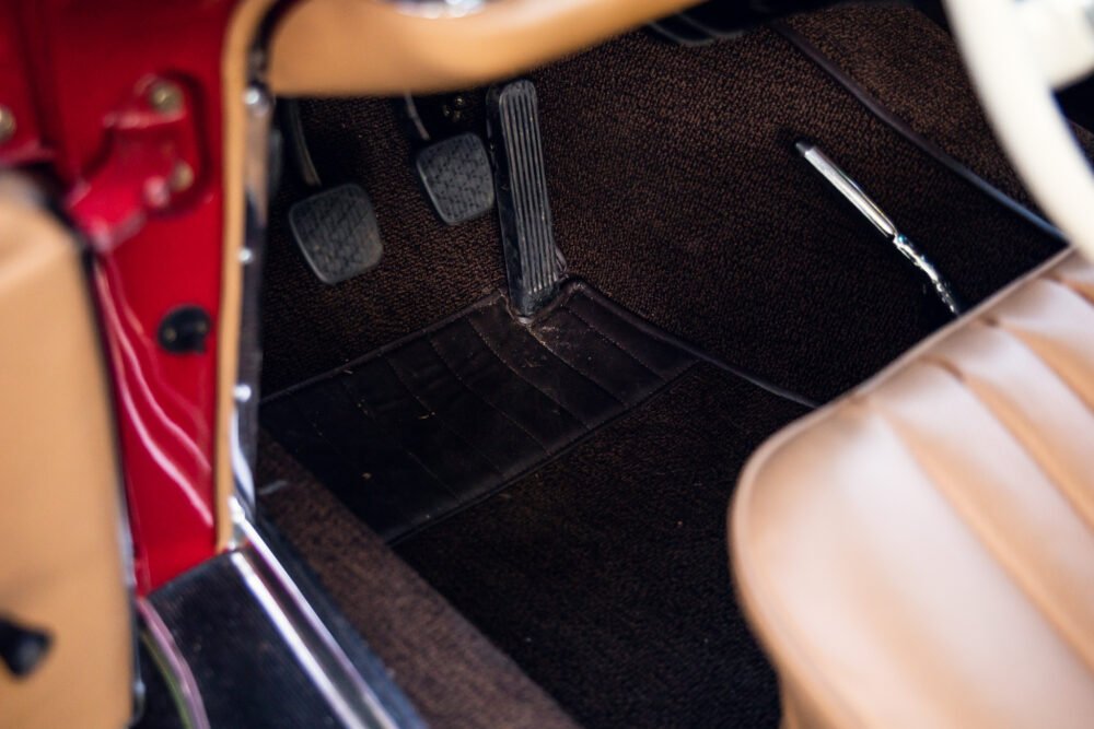 Classic car pedals and interior close-up.