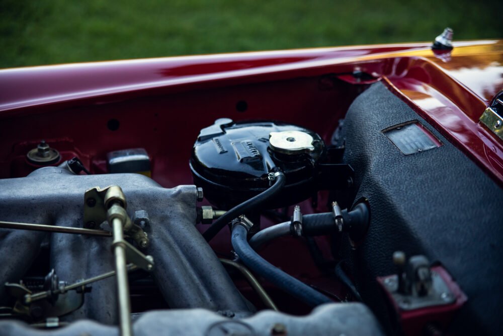 Close-up of vintage car engine in detail.