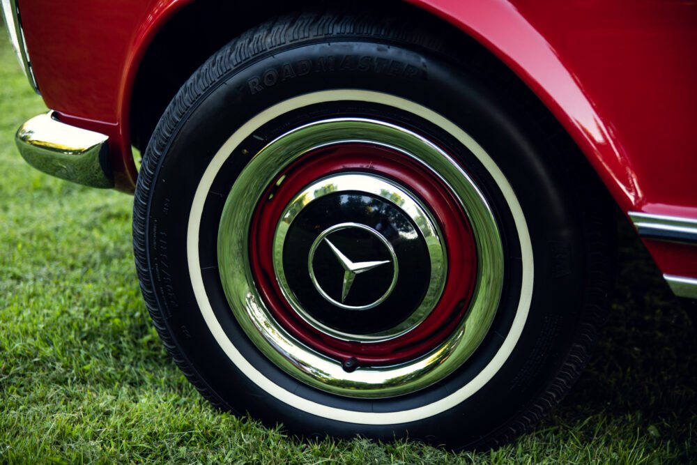 Close-up of vintage car tire with white wall.