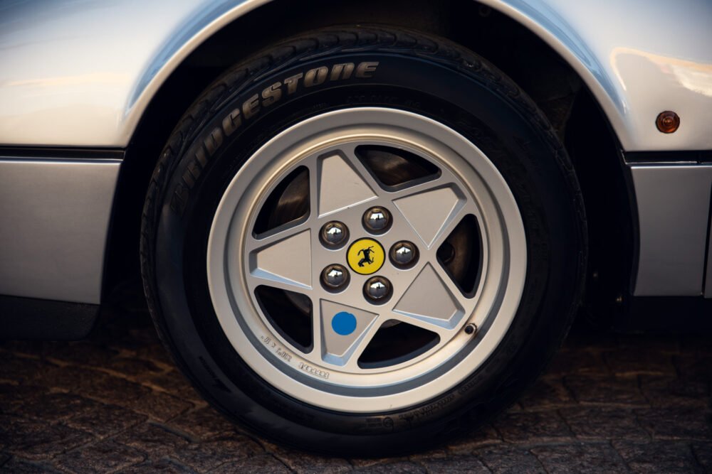 Close-up of Ferrari wheel and Bridgestone tire.