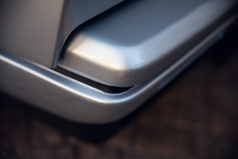 Close-up of modern car's sleek bumper design.