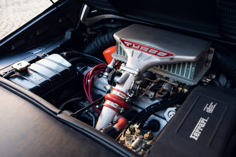 Detailed Ferrari turbo engine close-up.