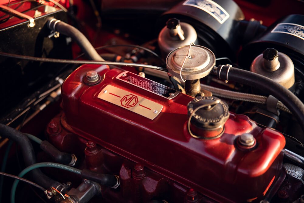 Vintage MG car red engine close-up.