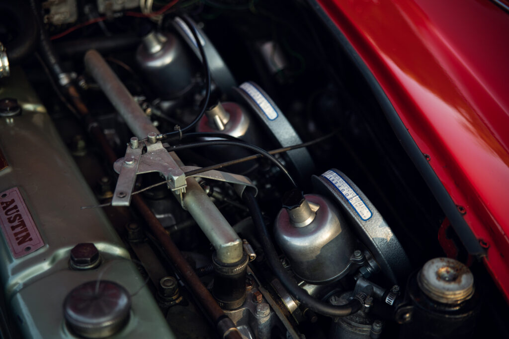 Close-up of a vintage Austin car engine.