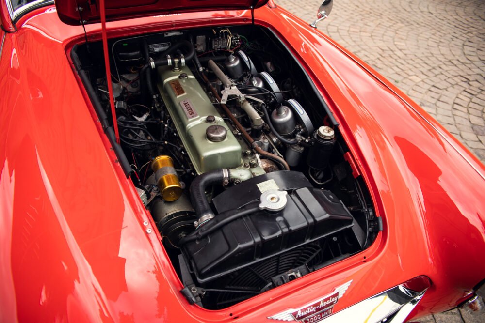 Red classic car engine, Austin-Healey 3000 MkII detail.