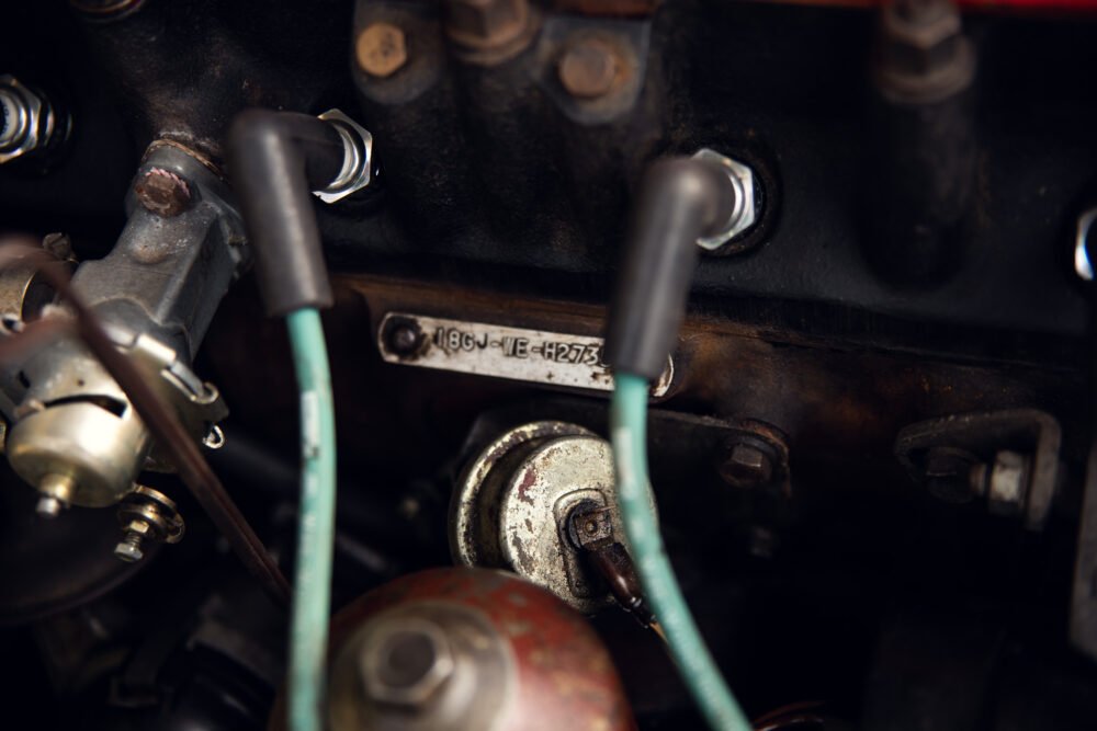 Close-up of vintage car engine components.