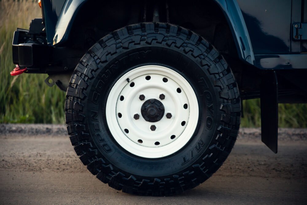 Close-up of rugged off-road vehicle tire.