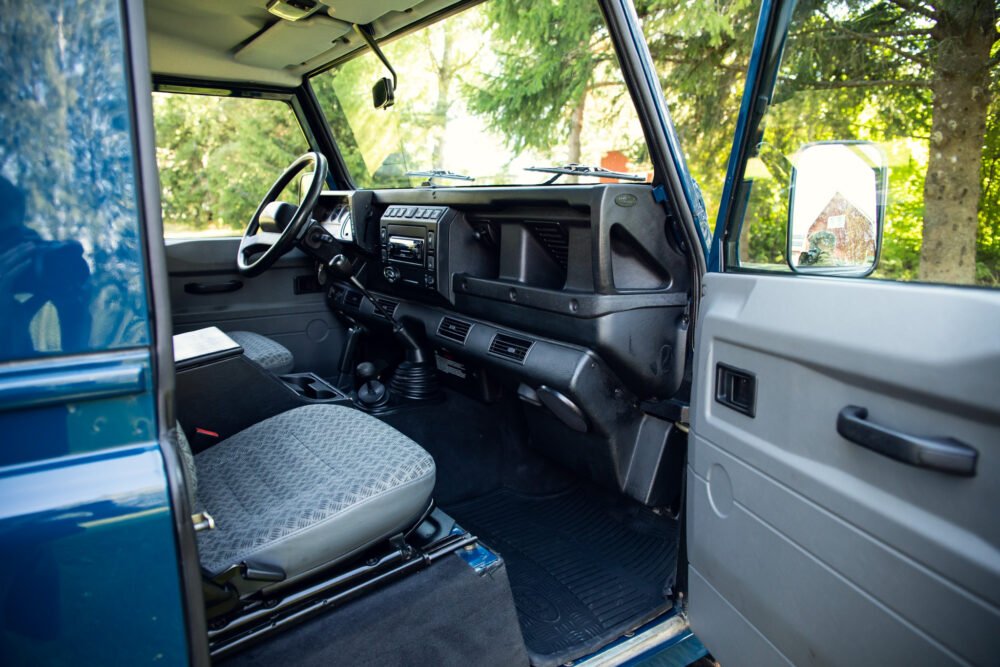 Interior view of an old blue SUV.