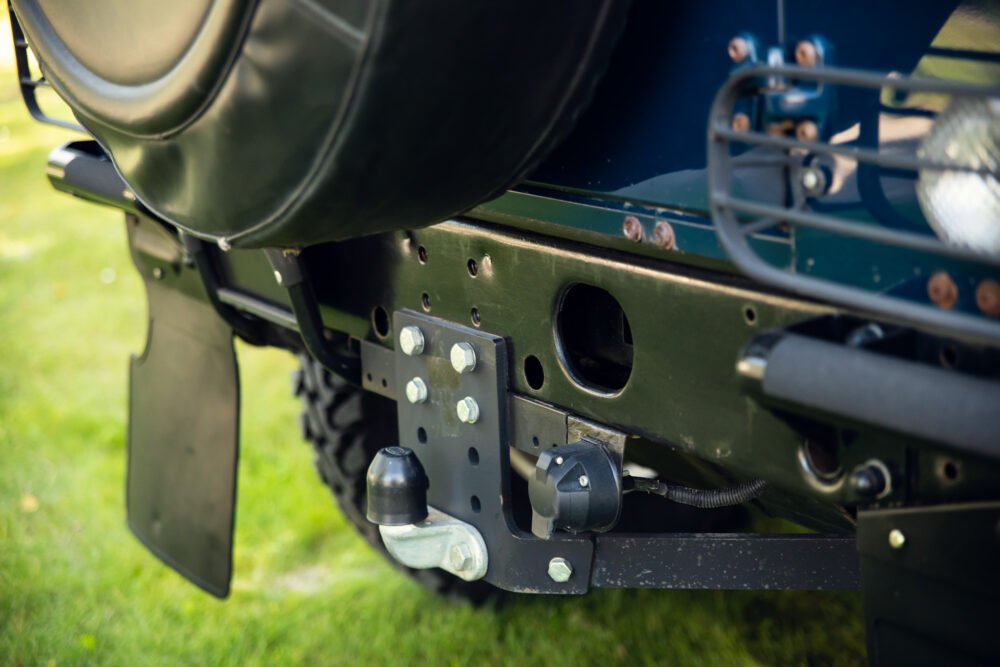 Close-up of truck's hitch and towing equipment.