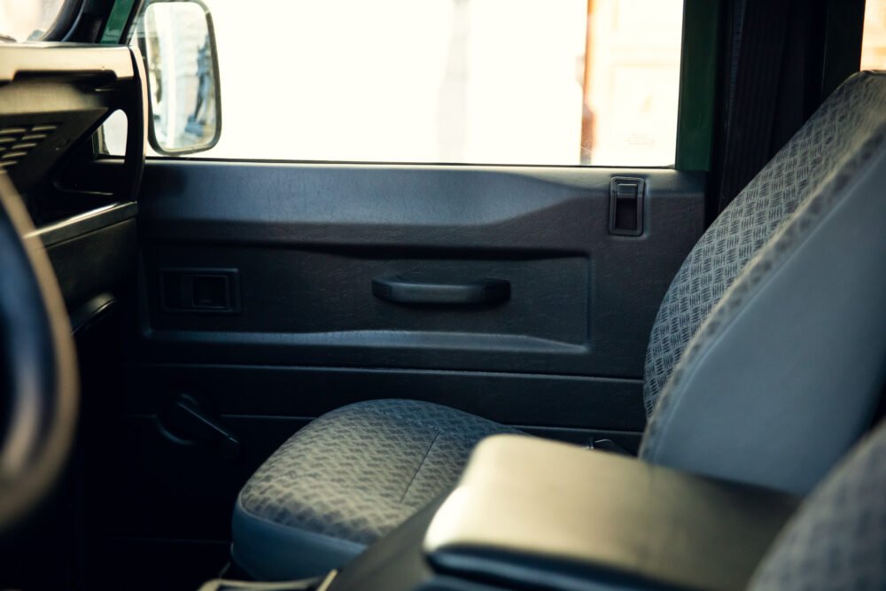 Interior view of a car's passenger side door.