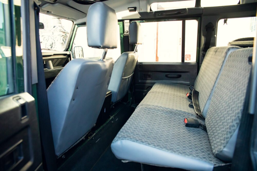 Interior view of a spacious, sunlit van.