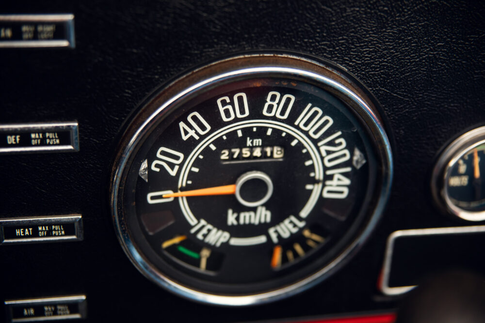 Vintage car speedometer showing kilometers per hour