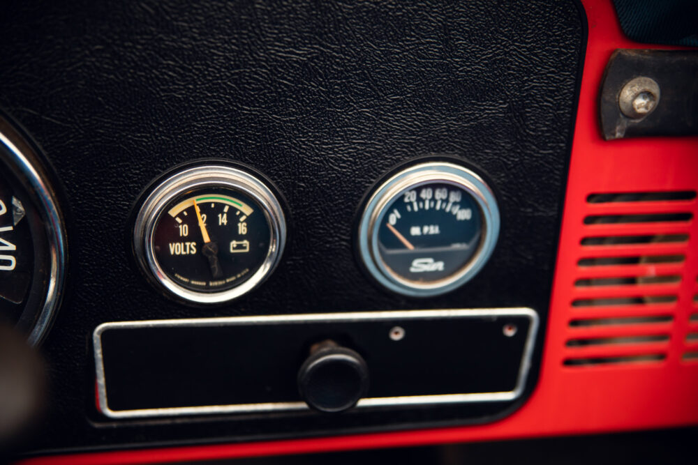 Classic car dashboard with voltage and RPM gauges