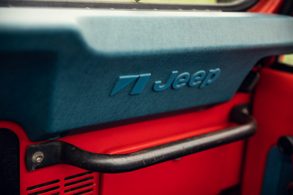 Close-up of Jeep logo on vehicle dashboard