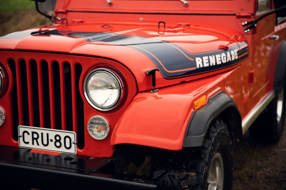 Red Jeep Renegade with CRU-80 license plate